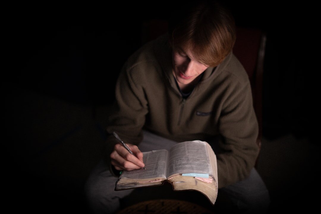 reader with book at night